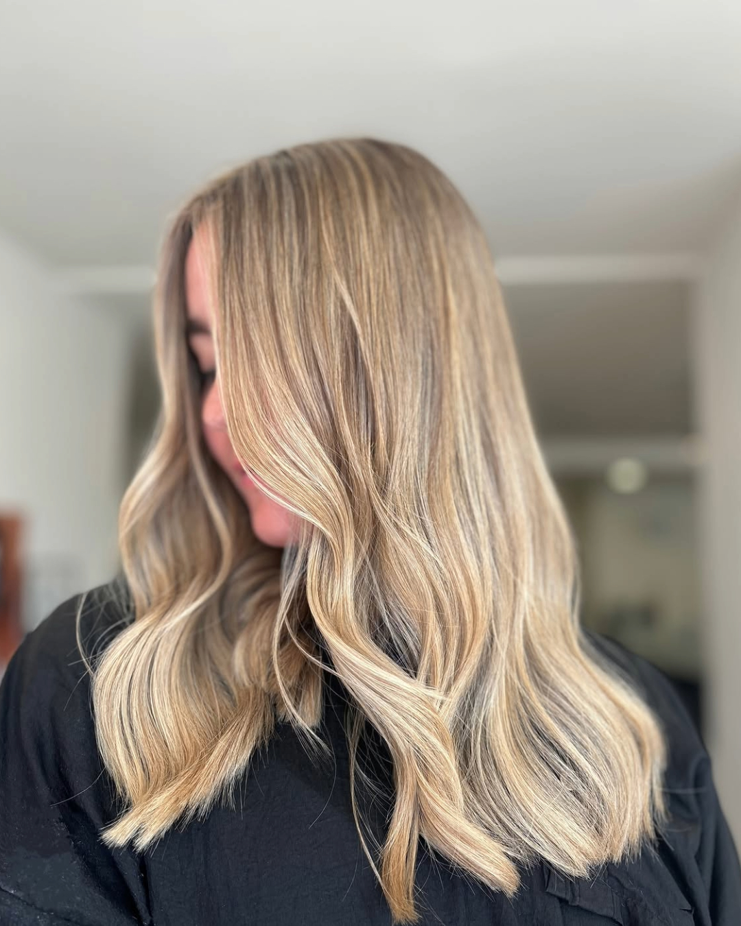 after image of a blonde hair colour transformation carried out at louise fudge hair colour slaon in heswall